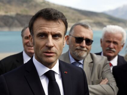 French President Emmanuel Macron speaks to journalists upon his arrival in Savines-Le-Lac, southeastern France, on March 30, 2023. - Emmanuel Macron reaffirmed on March 30, 2023 the usefulness of artificial water storage for farmers, such as that of Sainte-Soline where very violent clashes took place on Saturday, but proposed that …