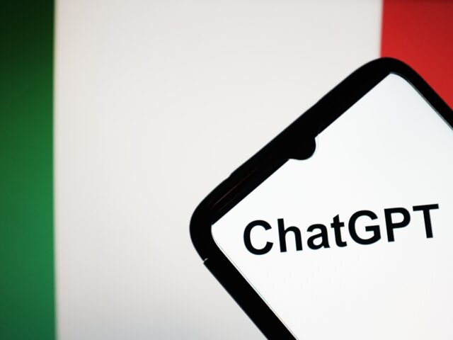 In this photo illustration a ChatGPT logo seen displayed on a smartphone screen and a flag of Italy on a MacBook screen in Athens, Greece on March 31, 2023. Italy has become the first Western country to block advanced chatbot ChatGPT over privacy concerns. (Photo Illustration by Nikolas Kokovlis/NurPhoto via …