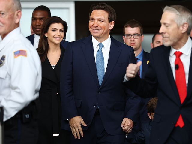 Florida Governor Ron DeSantis (C) enters with his wife Casey (2nd-L) before speaking about his new book ‘The Courage to Be Free’ in the Air Force One Pavilion at the Ronald Reagan Presidential Library on March 5, 2023 in Simi Valley, California. Gov. Ron DeSantis is considered to be one …