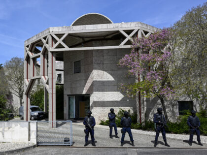 LISBON, PORTUGAL - MARCH 28: Mask-clad members of the PSP stand guard at the entrance of the Ismaili Center where an attacker stabbed to death two women on March 28, 2023, in Lisbon, Portugal. Two people died and two are hospitalized in serious condition after a man of Afghan nationality …