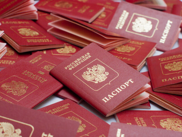 Russian international passport is used in travels, top view. International passport has in