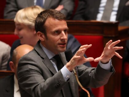 French Economy and Industry minister Emmanuel Macron gestures as he speaks during a session of questions to the Government at the French National Assembly, on May 18, 2016 in Paris. / AFP / KENZO TRIBOUILLARD (Photo credit should read KENZO TRIBOUILLARD/AFP via Getty Images)