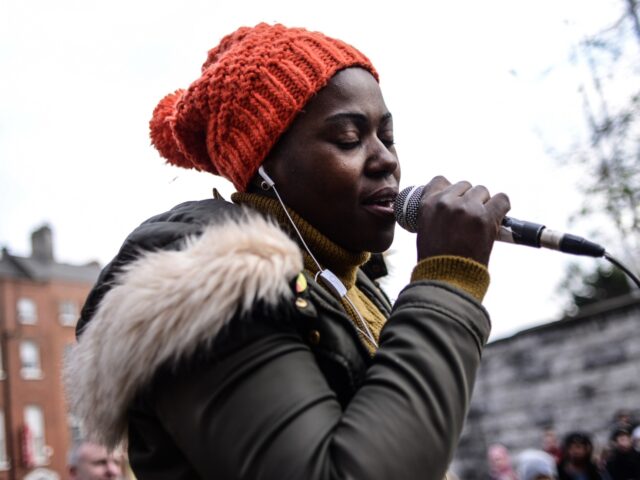 DUBLIN, IRELAND - JANUARY 21: Malawian asylum seeker Ellie Kisyombe attends a protest held