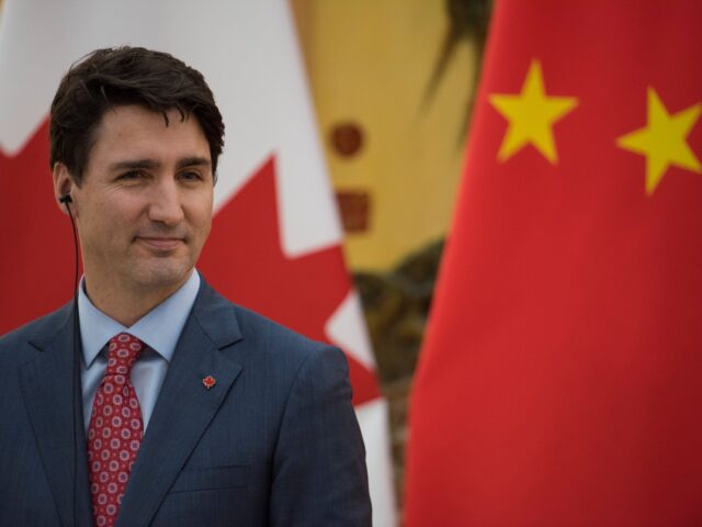 Canada's Prime Minister Justin Trudeau attends a press conference with China's Premier Li Keqiang at the Great Hall of the People in Beijing on December 4, 2017. / AFP PHOTO / POOL / Fred DUFOUR (Photo credit should read FRED DUFOUR/AFP via Getty Images)