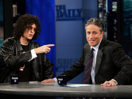 NEW YORK - DECEMBER 13: Radio personality Howard Stern talks with Jon Stewart during "The Daily Show With Jon Stewart" at the Daily Show Studios December 13, 2005 in New York City. (Photo by Scott Gries/Getty Images)