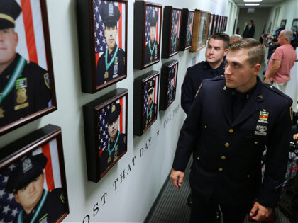 NEW YORK, NEW YORK - SEPTEMBER 07: Brothers and NYPD Officers James Vigiano (L) and Joseph Vigiano Jr. attend the unveiling of the 9/11 Memorial Wall at the Police Benevolent Association of the City of New York on September 07, 2021 in New York City. Joe and Jim Vigiano were …