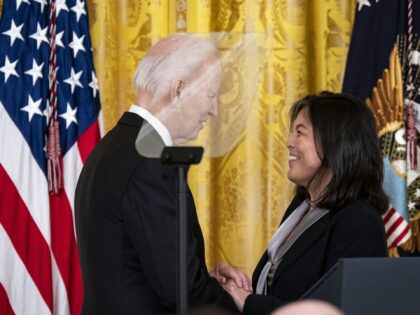 US President Joe Biden, left, greets Julie Su, deputy US secretary of labor, during a nomi