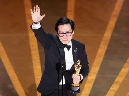 HOLLYWOOD, CA - MARCH 12: Ke Huy Quan accepts the award for Actor in a Supporting Role at the 95th Academy Awards in the Dolby Theatre on March 12, 2023 in Hollywood, California. (Myung J. Chun / Los Angeles Times)