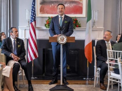 Ireland's Taoiseach Leo Varadkar, center, accompanied by Vice President Kamala Harris