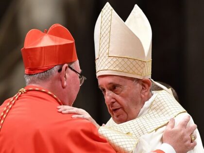 Pope Francis (R) embraces new Cardinal Luxembourgish prelate Jean-Claude Hollerich after he appointed him during an Ordinary Public Consistory for the creation of new cardinals, for the imposition of the biretta, the consignment of the ring and the assignment of the Title or Diaconate, on October 5, 2019 at St. …