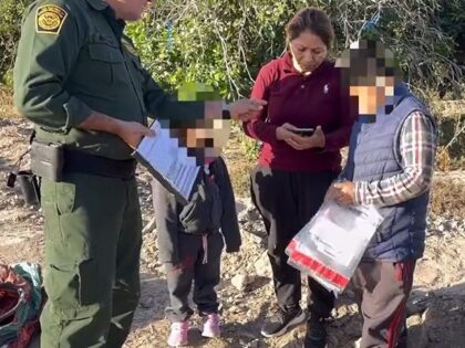 Texas DPS and Border Patrol reunite a migrant mother with her two children who were abandoned by human smugglers near the border. (Texas Department of Public Safety)