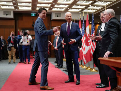 President Joe Biden and Canadian Prime Minister Justin Trudeau greet people at Parliament Hill, Friday, March 24, 2023, in Ottawa, Canada. (AP Photo/Andrew Harnik)