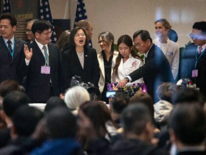 Taiwan's President Tsai Ing-wen, center, attends an event at the Taipei Economic and Cultural Office in New York, Thursday, March 30, 2023. (AP Photo/Yuki Iwamura)