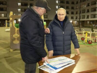 In this photo taken from video released by Russian Presidential Press Office on Sunday, March 19, 2023, Russian President Vladimir Putin, right, listens to Russian Deputy Prime Minister Marat Khusnullin at a newly built neighborhood during their visit to Mariupol in Russian-controlled Donetsk region, Ukraine. Putin has traveled to Crimea …