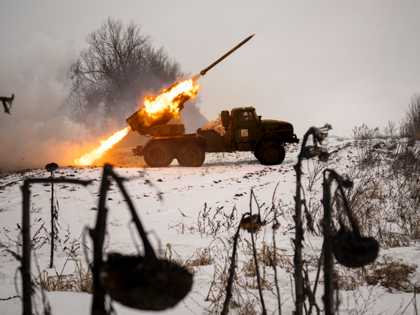 Ukrainian military fires from a multiple rocket launcher at Russian positions in the Khark