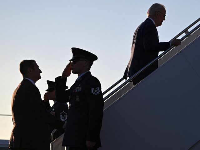 US President Joe Biden (C) boards Air Force One before departing Maxwell Air Force Base in