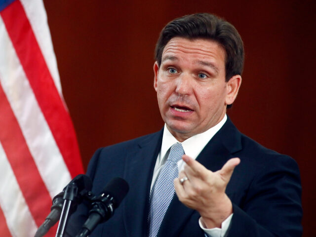 Florida Gov. Ron DeSantis answers questions from the media in the Florida Cabinet followin