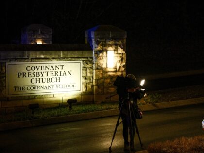 Baloons and Teddy bears are left on the outside the Covenant School building at the Covena