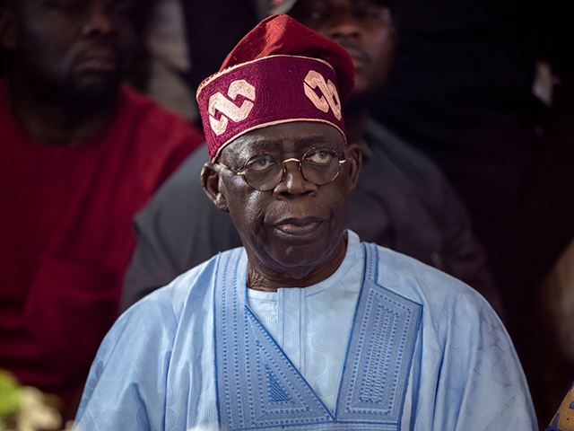 Bola Tinubu, of the All Progressives Congress, meets with supporters at the Party's campai