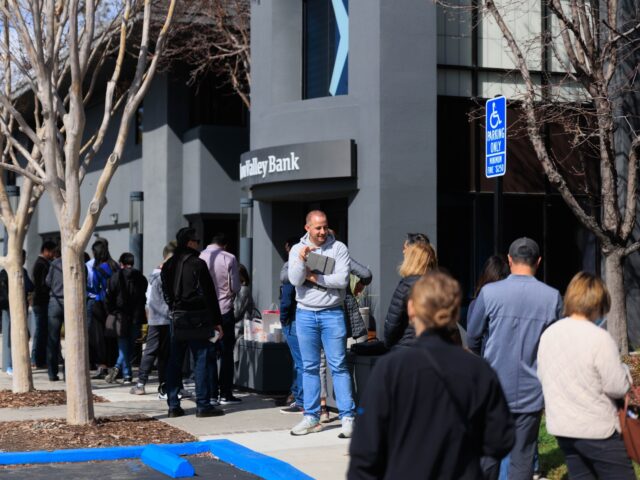 SANTA CLARA, CA, US - MARCH 13: People wait outside the Silicon Valley Bank headquarters i