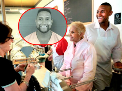 FILE - A customer picks up some food to-go from Sweetie Pie's owner Robbie Montgomery