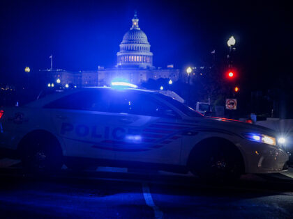 WASHINGTON, DC - MARCH 01: A police car blocks off a street near the U.S. Capitol building