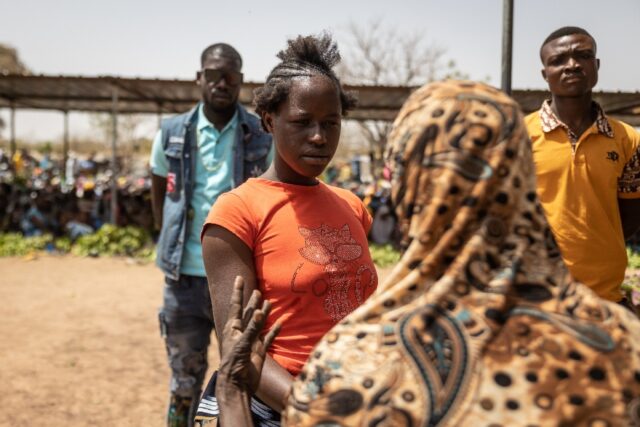 Burkina phenomenon: Amsetou Nikiema, centre, also called Adja