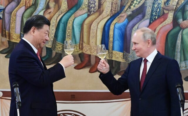 The talks were heavy on pomp and ceremony as Putin and Xi hailed a 'new era' in the relati