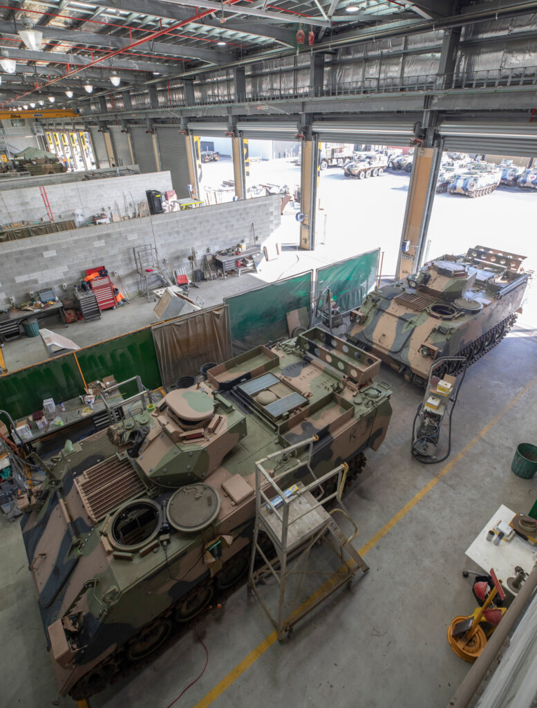 The first of fourteen M113 AS4 Armoured Personnel Carriers bound for Ukraine being prepared at Joint Logistics Unit – South East Queensland, RAAF Base Amberley.