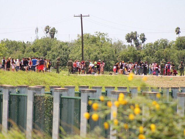 Thousands of Venezuelan migrants cross the Rio Grande into a makeshift camp in Brownsville, Texas. (Randy Clark/Breitbart Texas)