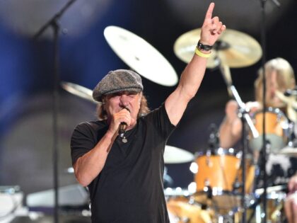 Brian Johnson of ACDC performs with US rock band the Foo Fighters onstage during the tapin
