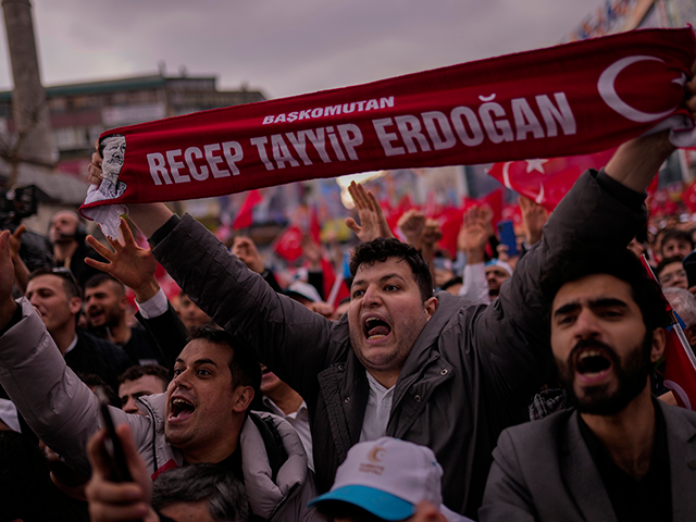 Supporters of Turkish President and People's Alliance's presidential candidate Recep Tayyip Erdogan gesture as they listen to his speech during an election rally campaign in Istanbul, Turkey, Friday, April 21, 2023. Presidential elections in Turkey are scheduled to take place on May 14. (AP Photo/Francisco Seco)