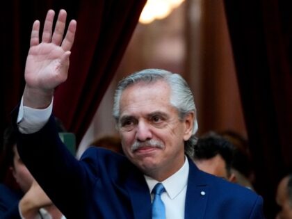 Argentine President Alberto Fernandez waves as he arrives to the opening session of Congress in Buenos Aires, Argentina, Wednesday, March 1, 2023. Fernandez announced on April 21, 2023 that he will not seek re-election in October elections.