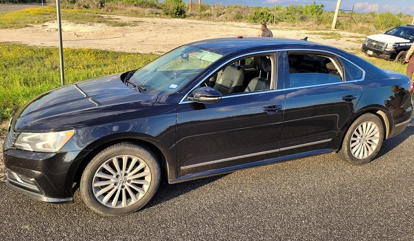 DPS troopers stopped a black Volkswagen Passat. The trooper arrested the driver for allegedly smuggling migrants. (Texas Department of Public Safety)