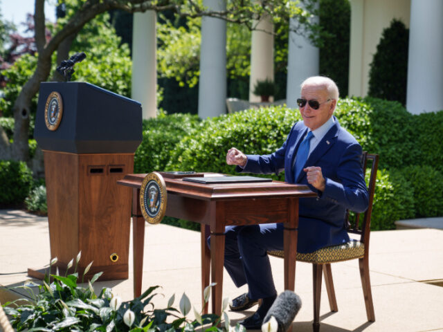 WASHINGTON, DC - APRIL 21: U.S. President Joe Biden remarks that the desk is hot from the