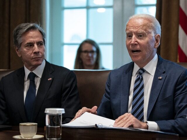 U.S. President Joe Biden speaks while Antony Blinken, U.S. secretary of state, left, listens during a cabinet meeting at the White House in Washington, D.C., U.S., on Tuesday, July 20, 2021. Biden administration officials say they're starting to see signs of relief for the global semiconductor supply shortage, including commitments …