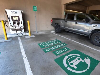A space remains open for an electric vehicle at a EV charging station in Monterey Park, California on May 18, 2021. - President Joe Biden's administration continues the push for alternative forms of transportation and energy and on a visit today to the Ford Motor plant in Dearborn, Michigan, Biden …
