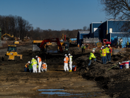 EAST PALESTINE, OH - MARCH 09: Ohio EPA and EPA contractors collect soil and air samples from the derailment site on March 9, 2023 in East Palestine, Ohio. Cleanup efforts continue after a Norfolk Southern train carrying toxic chemicals derailed causing an environmental disaster. Thousands of residents were ordered to …
