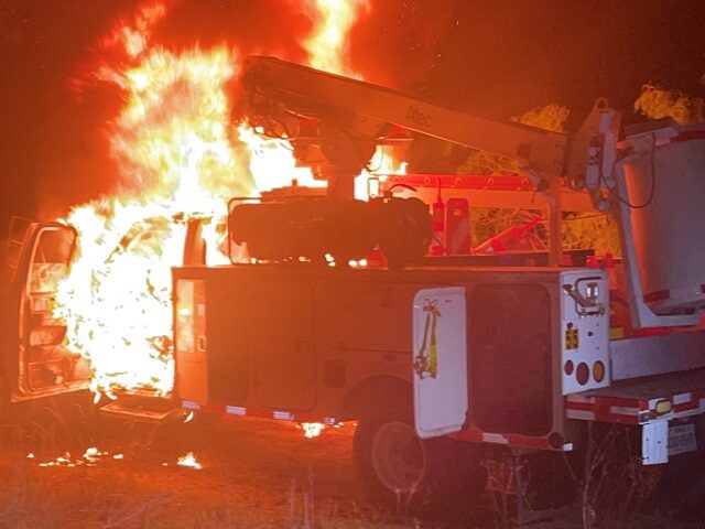 A suspected human smuggler's utility truck burst into flames following a crash near the border in Texas. (Law Enforcement Photo)
