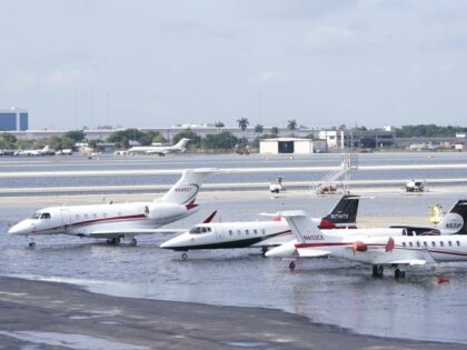 Small planes are parked at Fort Lauderdale- Hollywood International Airport, after the airport was force to shut down due to flooding, Thursday, April 13, 2023, in Fort Lauderdale, Fla. Fort Lauderdale issued a state of emergency as flood conditions continued through many areas. Over 25 inches of rain fell in …