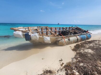 A makeshift boat lands on an island of the Dry Tortuga National Park in April with 20 migr