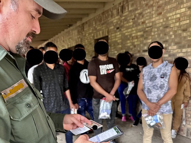 A Brownsville Station Border Patrol agents utilizes a new mobile processing application to speed the processing of migrants. (U.S. Border Patrol/Rio Grande Valley Sector)