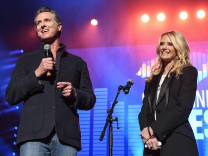 California Govenor Elect Gavin Newsom and Jennifer Siebel Newsom speak to the crowd at the Gavin Newsom "Califormia Rises" Benefit Concert to raise money for wildfire relief victims at Golden 1 Center on January 6, 2019 in Sacramento, California. (Photo by Steve Jennings/WireImage)