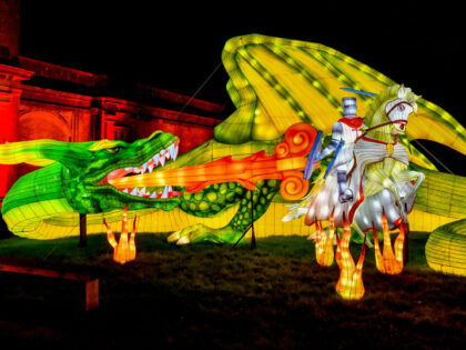 A light installation of a dragon breathes fire onto St. George in an illuminated sculpture in the Festival of Light, featuring themes of myths and legends from across the world, at Longleat House, Wiltshire. (Photo by Ben Birchall/PA Images via Getty Images)