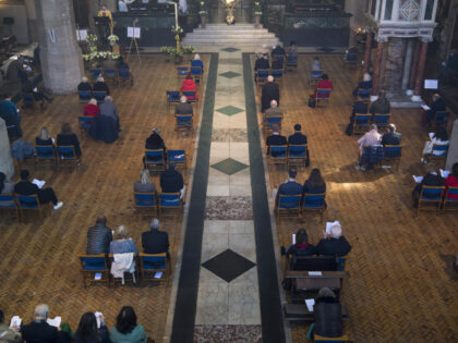 Members of the congregation social distance during the Easter Sunday service at the Holy Trinity Sloane Square church in Chelsea, London. Picture date: Sunday April 4, 2021. (Photo by Kirsty O'Connor/PA Images via Getty Images)