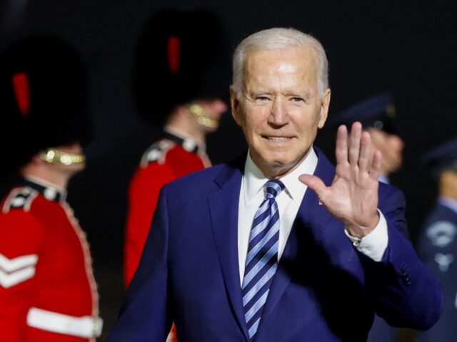 NEWQUAY, ENGLAND - JUNE 09: U.S. President Joe Biden waves upon arrival at Cornwall Airport Newquay, on June 9, 2021 near Newquay, Cornwall, England. On June 11, Prime Minister Boris Johnson will host the Group of Seven leaders at a three-day summit in Cornwall, as the wealthiest nations look to …