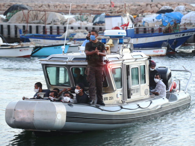 BEN GARDANE, TUNISIA - JULY 08: 50 irregular migrants whose boats broke down off the coast