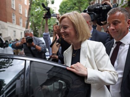 Britain's Foreign Secretary and a contender for the leader of the Conservative party, and Britain's next Prime Minister, Liz Truss enters a car after leaving a hustings event in central London on July 21, 2022. - Conservative rivals Rishi Sunak and Liz Truss, offering competing answers to Britain's multiple crises, …