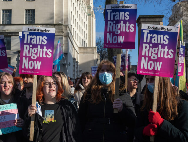Trans rights activists attend a protest opposite Downing Street on 21 January 2023 in Lond