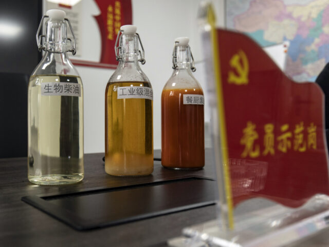 Sample bottles of aviation biofuel, from left, biodiesel, industrial mix oil, left, and ra